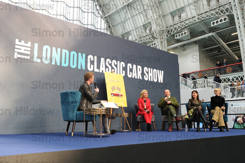 London-Classic-Car-Show-2023-317 
 London Classic Car Show 2023
l/r, Alex Brundle interviewing Sally Phillips,Tony Pitts,Ronni Ancona, Katherine Kelly, about their film, Classic. 
Picture by:Simon Hildrew
www.simonhildrew.com
07970 808510